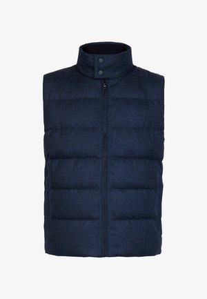 Mörkblå vadderad väst med hög krage, dragkedjefrämre stängning och tryckknappar. Tillverkad av texturerat material med quiltad design.