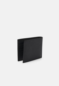 Black leather wallet with a textured finish, featuring multiple card slots and a slim profile. It has a smooth, minimalist design.