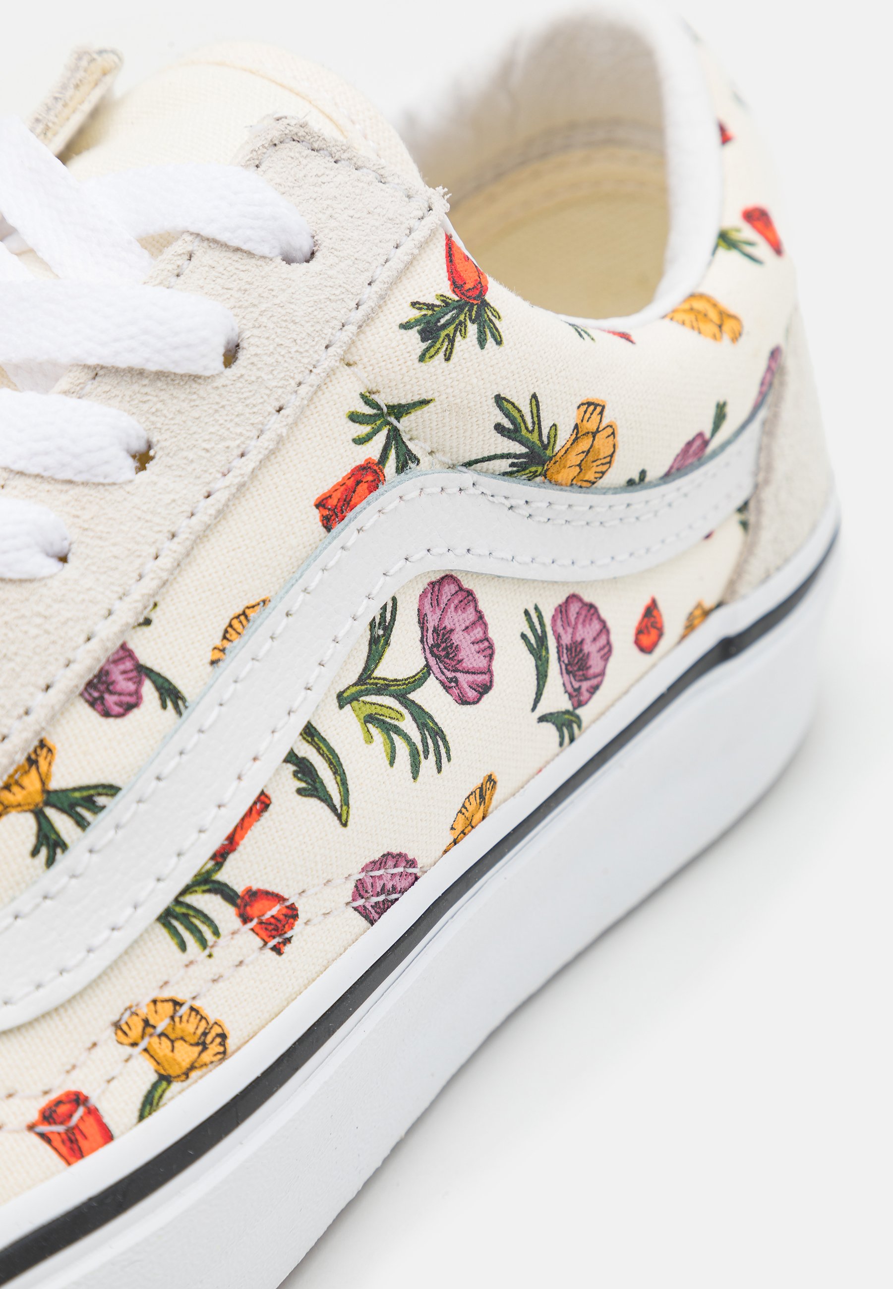 cream vans trainers