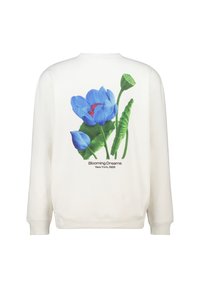 Witte sweatshirt met een grote blauwe bloemenafbeelding met groene bladeren en de tekst "Blooming Dreams, New York, 1989" op de achterkant.