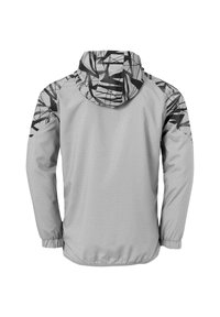 Veste gris clair avec des motifs géométriques noirs sur les épaules et la capuche. Équipée de poignets élastiques et d'une capuche ajustable avec cordon.