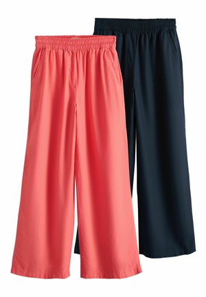 Deux pantalons à jambes larges avec tailles élastiques et poches latérales, un corail et un noir, présentés sur un fond blanc.