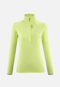 Sweat à col zippé en vert lime vif avec un motif gaufré, manches longues et une poche poitrine. Présente des accents noirs au niveau des poignets.
