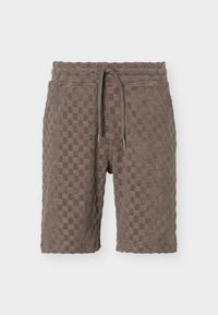 Shorts en éponge marron avec une texture à carreaux, taille élastique et cordon de serrage ajustable à l'avant.