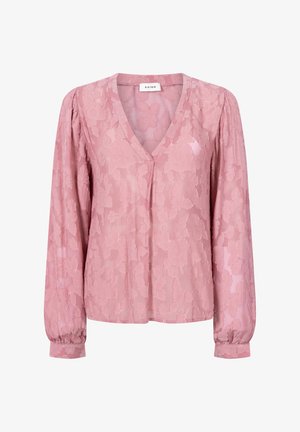 Roze blouse met lange mouwen en een V-hals, voorzien van een textuur met bloemmotief en ruches op de schouders. Zachte, doorschijnende stof met een relaxte pasvorm.