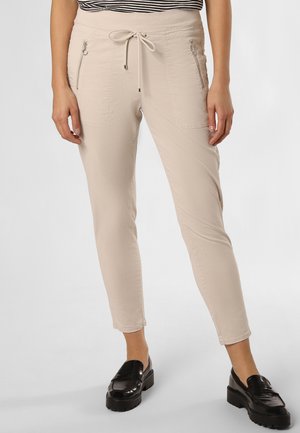 Helle beigen Hosen mit einem Kordelzugbund, vorderen Reißverschlusstaschen und einer schmalen Passform. Glatte Textur mit subtilen Stickdetails.