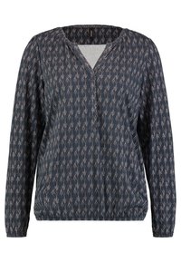 Blus med långa ärmar i mörk marinblått tyg med en mjuk textur, prydd med ett geometriskt mönster i vitt och ljusrosa. V-ringning och rynkad nederkant.