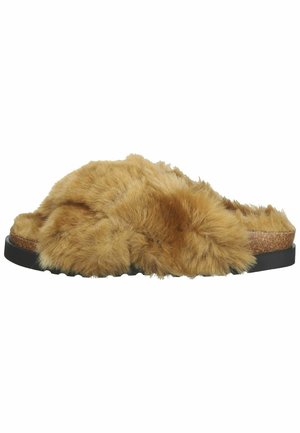 Faux fur slide sandal in tan, with a thick, fluffy upper and a cork footbed; features a black rubber outsole for traction.