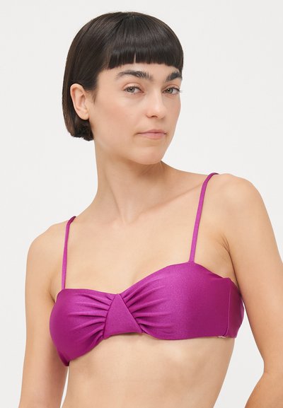 Violeta bikini tops ar regulējamām plānām siksnām, ar savīti frontālo dizainu un teksturētu audumu. Gluda, spīdīga materiāla.
