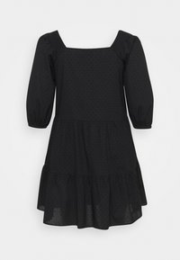 Schwarzes Polka-Dot-Kleid mit quadratischem Ausschnitt, Puffärmeln und einem gestuften, rüschierten Saum. Hergestellt aus leichtem Stoff mit einer weichen Textur.