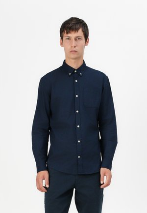 Marineblauwe langermige button-up shirt in een katoenmix, met een borstzak en witte knopen. Zachte textuur, klassiek kraagontwerp.