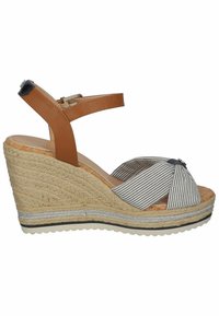 Wedge sandals with striped fabric upper, brown leather ankle strap, and woven jute platform. Features silver accent and textured sole.