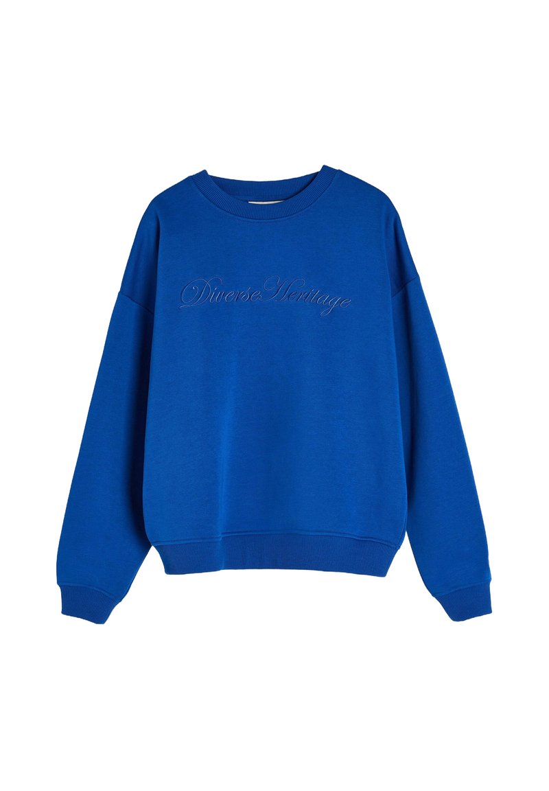 Niebieska bluza z długimi rękawami, okrągłym dekoltem, ściągaczami przy rękawach i u dołu. Posiada haftowany napis "Różnorodne Dziedzictwo" na przodzie. Miękka tkanina.