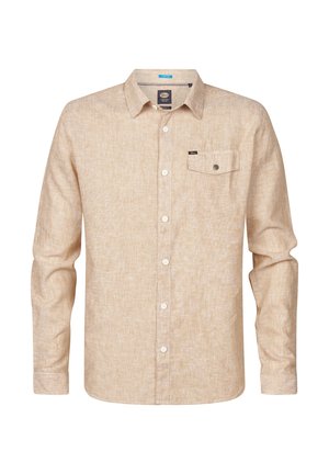 Chemise à manches longues beige clair avec un motif texturé, poche poitrine unique et ourlet arrondi. Comprend des boutons blancs et un col.