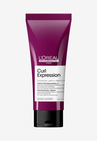 Curl Expression professionele crème in een paarse tube van 200 ml met een zwarte basis. Bevat een etiket met witte tekst dat ingrediënten en gebruiksinstructies detailleert.