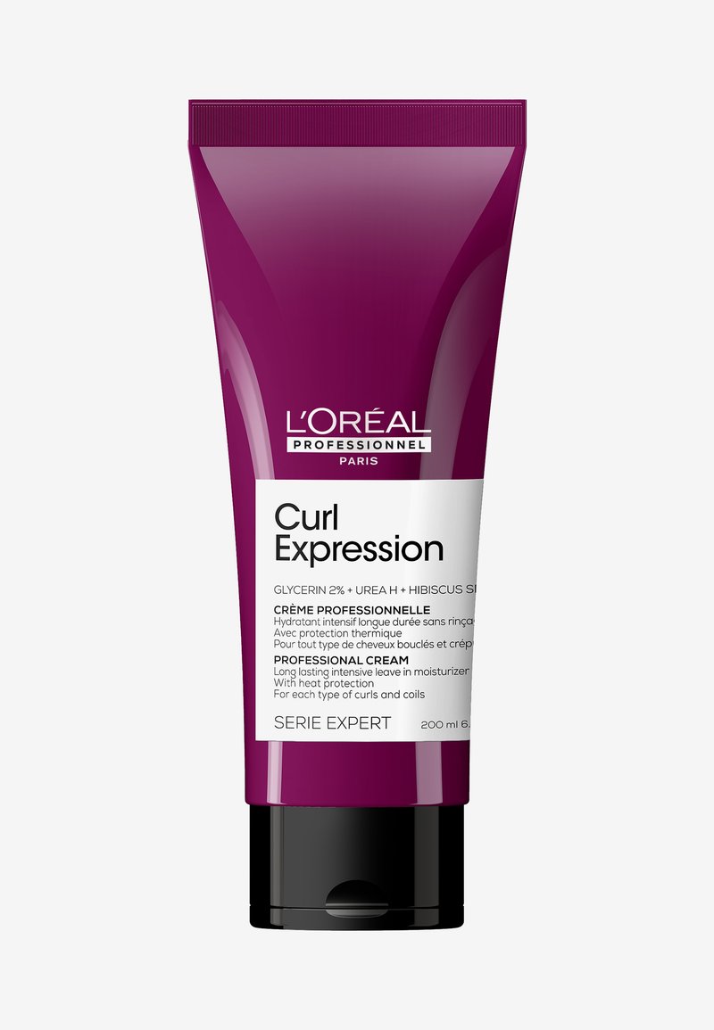 Curl Expression professionele crème in een paarse tube van 200 ml met een zwarte basis. Bevat een etiket met witte tekst dat ingrediënten en gebruiksinstructies detailleert.