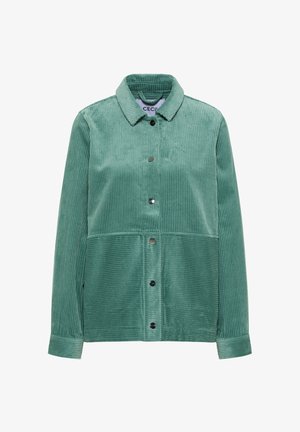 Giacca in corduroy verde menta con colletto e bottoni a pressione frontali, caratterizzata da pannelli con texture rigata verticale e orizzontale.