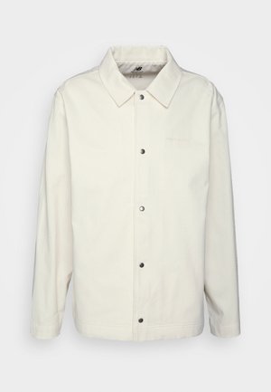 New Balance ATHLETICS NATURE STATE COACHES  - Ljetna jakna - greige