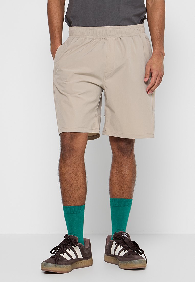 Rossignol Outdoorshorts zandkleur Rossignol Outdoorshorts zandkleur