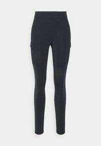 Svart, högmidjad tights gjorda av elastiskt material. Har sidofickor och en mjuk yta. Figursydd design med ankellång täckning.