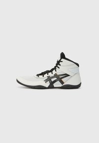 White high-top athletic shoe made of mesh and synthetic materials. Features black laces, a textured sole, and a striking black and orange design.