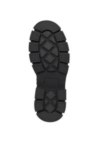 Black rubber shoe sole featuring a textured design with rectangular and diamond-shaped patterns for grip and traction.