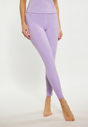 Paarse legging met een gladde textuur, nauwsluitend ontwerp en contrasterende stiksels. Heeft een middelhoge tailleband en is enkel lengte.