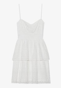 Biała koronkowa sukienka z dopasowanym gorsetem, regulowanymi ramiączkami i warstwową spódnicą. Misterny wzór na całej tkaninie nadaje teksturę.