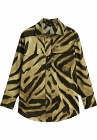 Button-up shirt in beige and black zebra print, featuring a collar, two front pockets, and long sleeves with a relaxed fit.