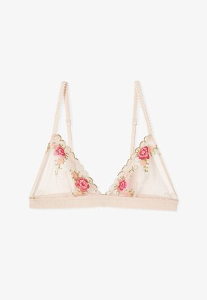 Soutien-gorge bralette en dentelle beige transparente avec bretelles réglables et broderie florale rose sur les bonnets.