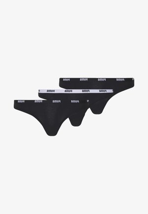 Black cotton thong underwear set, featuring three pieces with a white branded waistband. Soft texture and minimalist design.