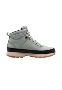 Bota de senderismo de corte medio con cuero y malla de color verde claro, acentos de goma negra, suela beige y suela exterior marrón en contraste. Sistema de cordones de seis agujeros.