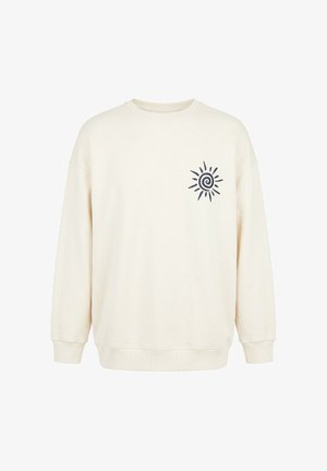 Cremefarvet sweatshirt med lange ærmer, ribstrikkede manchetter og kant, med et lille sort spiralformet solmotiv på venstre bryst.
