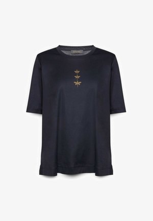 Granatowa koszula z krótkim rękawem wykonana z bawełny, ozdobiona trzema złotymi ważkami ułożonymi pionowo na środku. Miękka w dotyku, luźny krój.