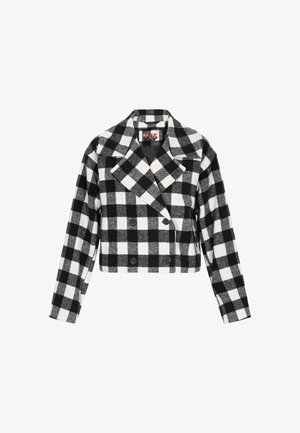 Cropped double-breasted jacket in black and white checkered pattern. Features a lapel collar and two black buttons on the front. Soft fabric texture.