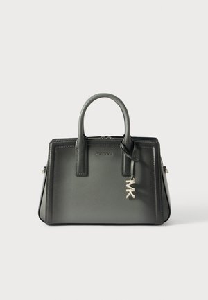 Structured green leather handbag with dual handles, silver MK logo charm, and zip closure. Features a smooth texture with tonal stitching.