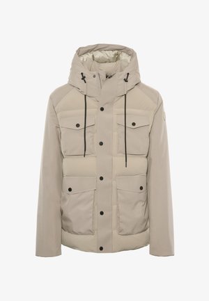 Giacca beige con cappuccio, corpo trapuntato, due tasche sul petto e coulisse regolabili. Presenta bottoni neri a contrasto e dettagli in metallo.