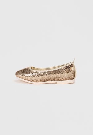 Ballet flats in metallic gold with a textured sequined upper, rounded toe, and a small golden accent at the heel. Lightweight, flexible sole.