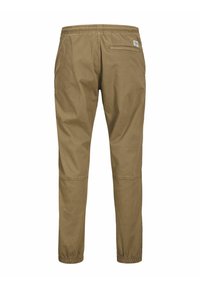 Pantalons marron clair avec une coupe décontractée, ceinture élastique, poche à l'arrière et poignets élastiques à la cheville pour un maintien sûr et un confort optimal.