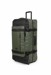 Borsa da viaggio a rotelle in verde oliva e nero. Realizzata in tessuto resistente, presenta un manico telescopico, numerose cerniere e cinture laterali.