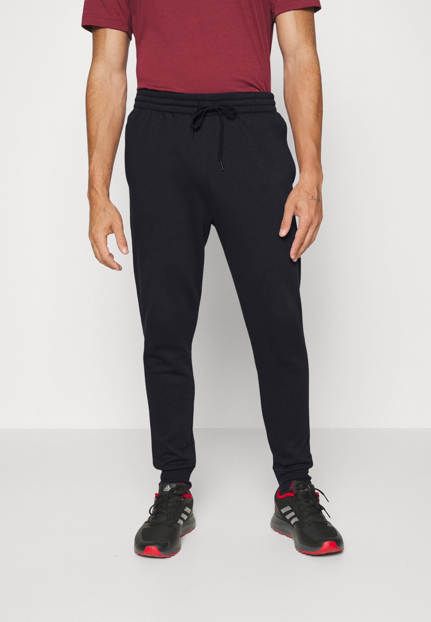 adidas tapered tracksuit bottoms mens