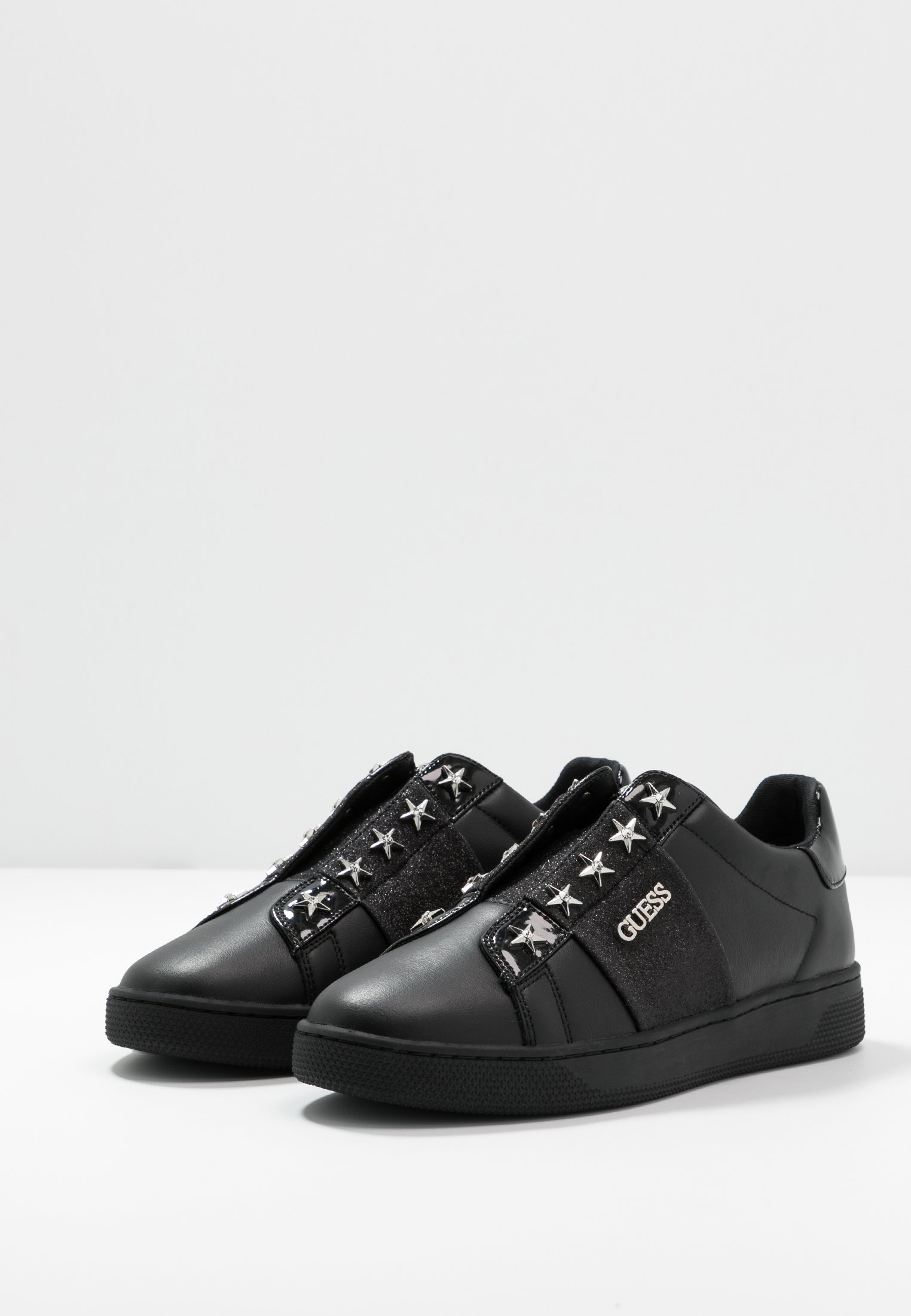 guess black slip ons