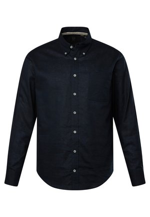 Donkerblauwe overhemdd met lange mouwen, gemaakt van gestructureerde stof, met een borstzak en witte knopen.
