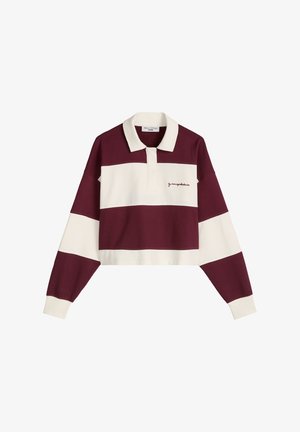 Maillot de rugby à manches longues avec larges rayures horizontales bordeaux et blanches, col blanc et petit texte brodé sur la poitrine.