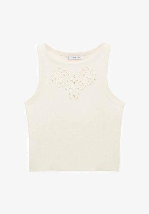 Kremasti bez rukava top s cvjetnim izrezanim dizajnom na sredini. Izrađen od teksturirane, pletene tkanine s uskim fitom.