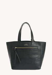 Sac tote noir en cuir avec doubles poignées, une poche zippée dorée à l'avant, et "LOXWOOD LE CABAS PARISIEN" embossé au-dessus de la fermeture éclair.