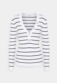 Maglione bianco a maniche lunghe con costine, caratterizzato da strisce verticali nere, un profondo scollo a V e tre bottoni circolari decorativi sul petto.