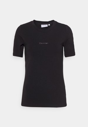Czarna, bawełniana koszulka z krótkim rękawem i okrągłym dekoltem. Na przedzie subtelne haftowane logo "Calvin Klein".