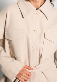 Gina Tricot Pitkä takki - off-white