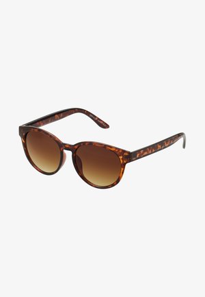 Tortoiseshell sunglasses with a vintage cat-eye shape, gradient brown lenses, and smooth, glossy finish on the frames and arms.